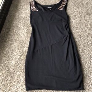 Black knit sheath by Express with copper studded shoulders. Size 12